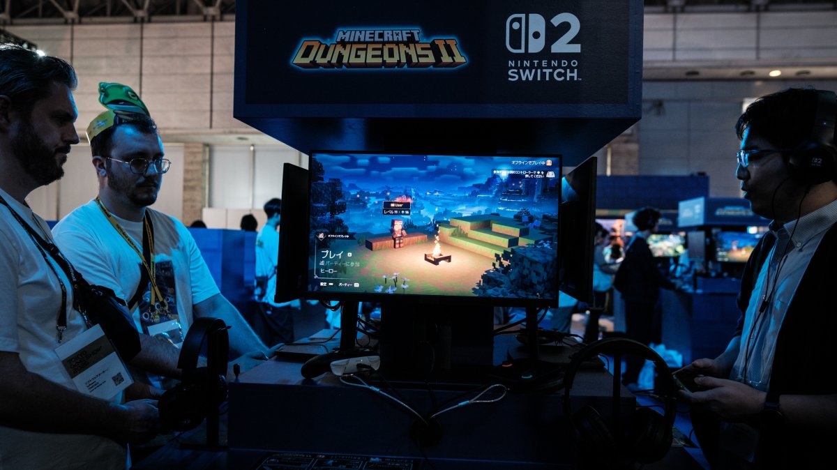 Gamers play the upcoming action role-playing game "Minecraft Dungeons II" during the Tokyo Game Show (TGS) 2026 at Makuhari Messe in Chiba, near Tokyo, Japan, Sept. 17, 2026. (EPA Photo)