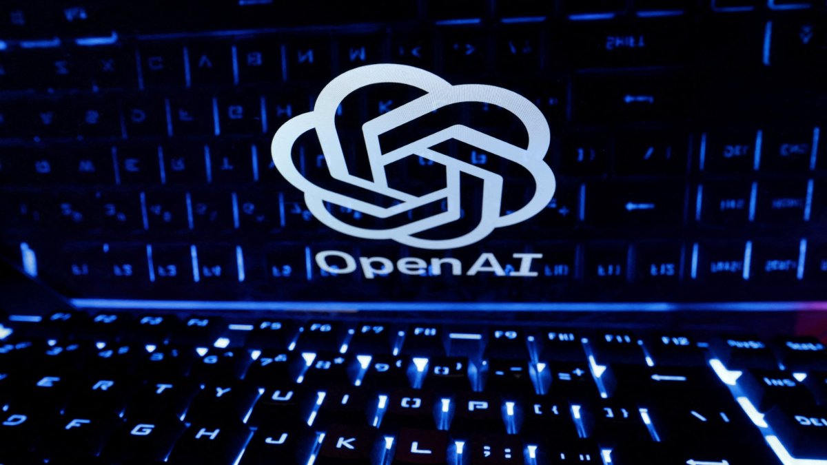 A keyboard is placed in front of a displayed OpenAI logo in this illustration taken Feb. 21, 2023. (Reuters Photo)