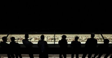 The first visitors view the Bayeux Tapestry on display for the public at the British Museum, London, U.K., Sept. 10, 2026. (Reuters Photo)