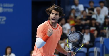 Carlos Alcaraz reacts after scoring a point against Alex Michelsen of the US during his round-of-32 match of the Japan Open tennis tournament at Ariake Colosseum, Tokyo, Japan, Oct. 1, 2026. (EPA Photo)