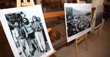 Archival photos of Ahmet Bedevi, better known as the “Tarzan of Manisa,” are displayed during an event in Manisa, Türkiye, Oct. 1, 2026. (IHA Photo)