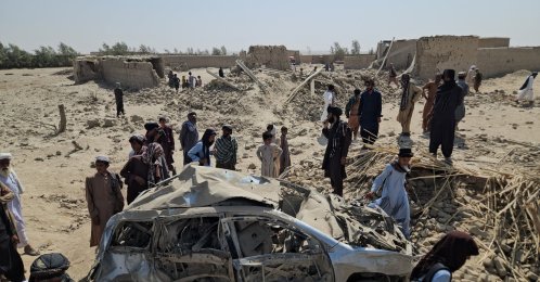 Locals survey the scene of Pakistani airstrikes in Helmand, Afghanistan, Oct. 1, 2026. (EPA Phto)