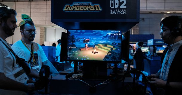 Gamers play the upcoming action role-playing game "Minecraft Dungeons II" during the Tokyo Game Show (TGS) 2026 at Makuhari Messe in Chiba, near Tokyo, Japan, Sept. 17, 2026. (EPA Photo)