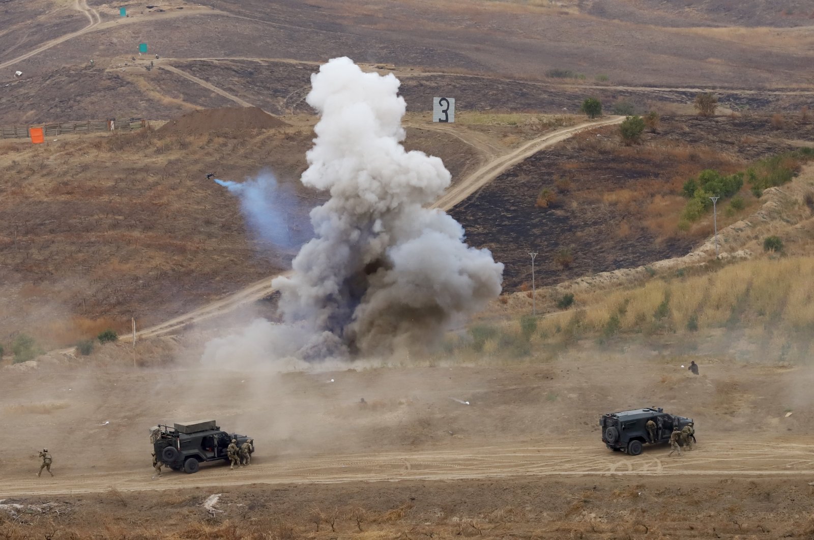 Turkish defense chief attends major joint military drills in