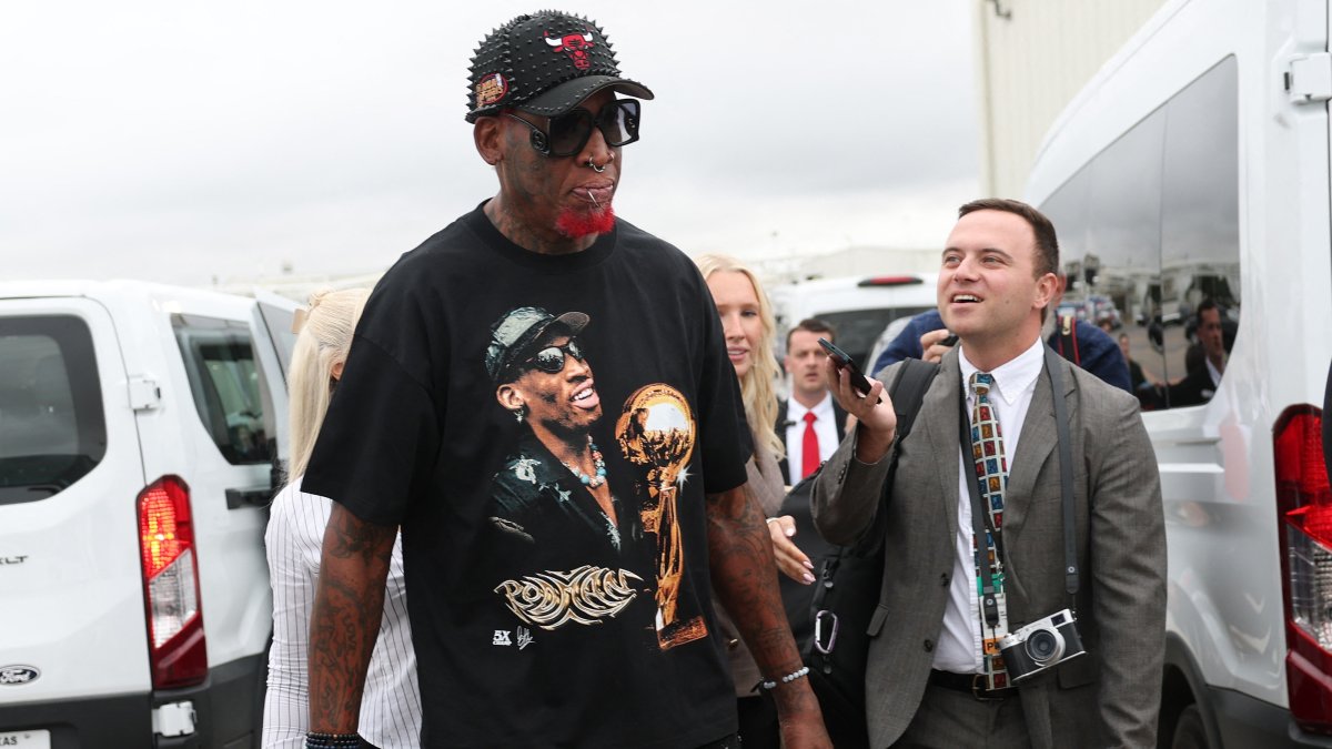 Former NBA player Dennis Rodman (C) departs after U.S. President Donald Trump spoke during a visit to the Peterbilt Motors truck plant, Denton, U.S., Oct. 1, 2026. (AFP Photo)