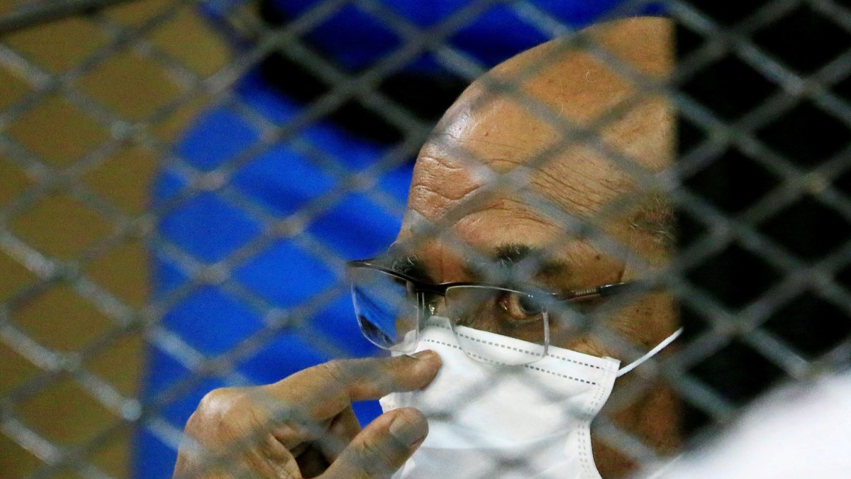 Sudan's ousted President Omar al-Bashir is seen inside the defendant's cage during his trial, Khartoum, Sudan, Sept. 15, 2020. (Reuters Photo)