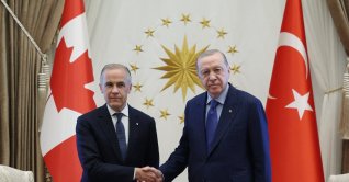 President Recep Tayyip Erdoğan and Canadian Prime Minister Mark Carney shake hands as they meet at the Presidential Complex in Ankara ahead of the 36th NATO Heads of State and Government Summit, July 7, 2026. (Turkish Presidential Service Handout via AFP)