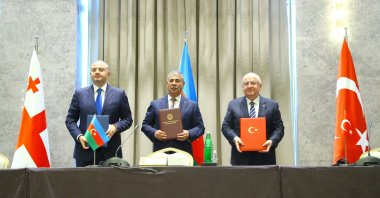 Turkish Defense Minister Yaşar Güler (R), Azerbaijani Defense Minister Zakir Hasanov (C) and Georgian Defense Minister Irakli Chikovani (L) sign the meeting protocol, Shusha, Azerbaijan, Oct. 2, 2026. (AA Photo)