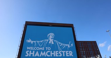 An advertisement billboard for the betting company Paddy Power, reading 'Welcome to Shamchester', is pictured in Manchester, U.K., Oct. 1, 2026. (AFP Photo)