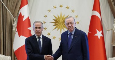 President Recep Tayyip Erdoğan and Canadian Prime Minister Mark Carney shake hands as they meet at the Presidential Complex in Ankara ahead of the 36th NATO Heads of State and Government Summit, July 7, 2026. (Turkish Presidential Service Handout via AFP)