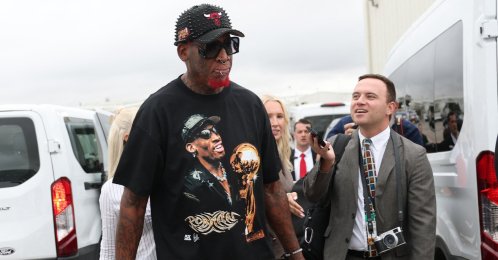 Former NBA player Dennis Rodman (C) departs after U.S. President Donald Trump spoke during a visit to the Peterbilt Motors truck plant, Denton, U.S., Oct. 1, 2026. (AFP Photo)