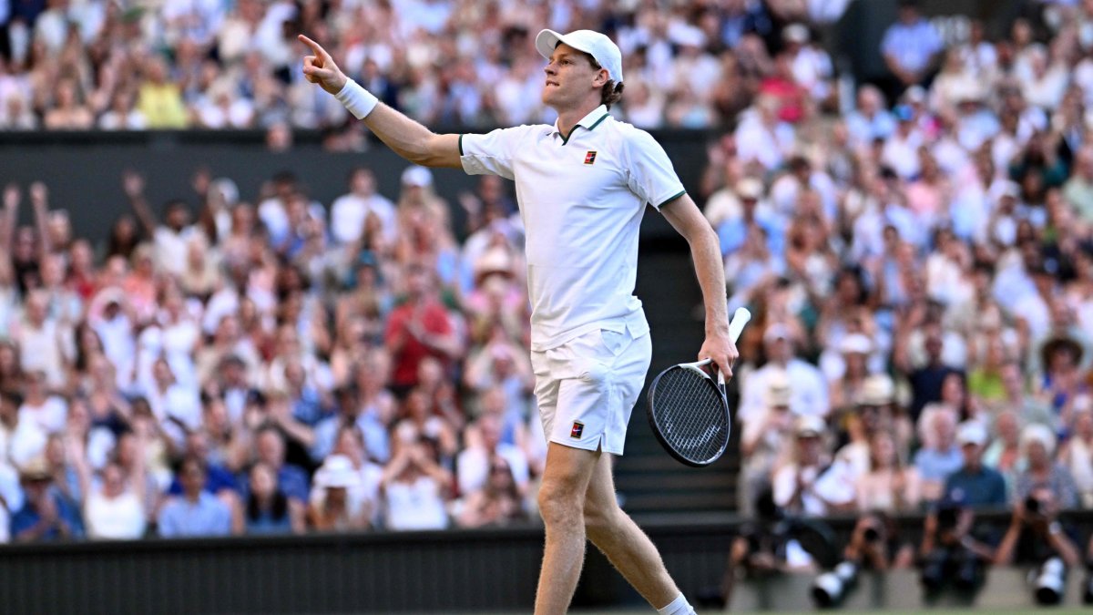 Italy's Jannik Sinner celebrates beating Germany's Alexander Zverev during their men's singles final tennis match on the fourteenth day of the 2026 Wimbledon Championships at The All England Lawn Tennis and Croquet Club, Wimbledon, London, July 12, 2026. (AFP Photo)