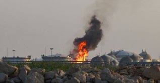 Flames burn at a facility belonging to Saudi oil giant Aramco south of Riyadh, Saudi Arabia, Oct. 3, 2026. (AFP Photo)
