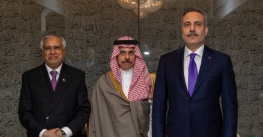Foreign Minister Hakan Fidan (R) poses with Saudi Foreign Minister Faisal bin Farhan (C) and Pakistani Foreign Minister Mohammad Ishaq Dar after a meeting in New York, U.S., Sept. 25, 2026. (AA Photo)