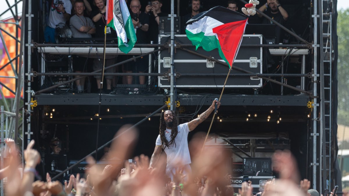 Bob Vylan waves a Palestinian flag as he performs on the West Holts stage during day four of Glastonbury Festival 2025, Glastonbury, England, U.K., June 28, 2025. (Getty Images Photo)