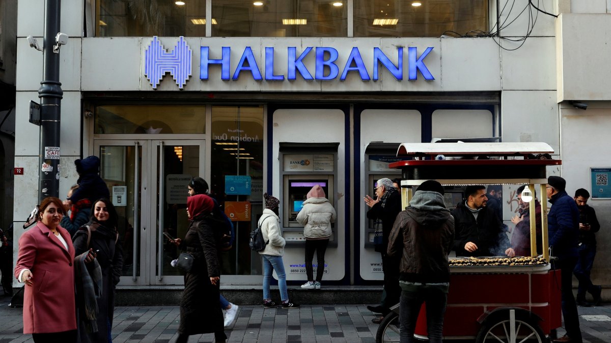 People walk past a branch of Halkbank in central, Istanbul, Türkiye, Jan. 22, 2020. (Reuters Photo)