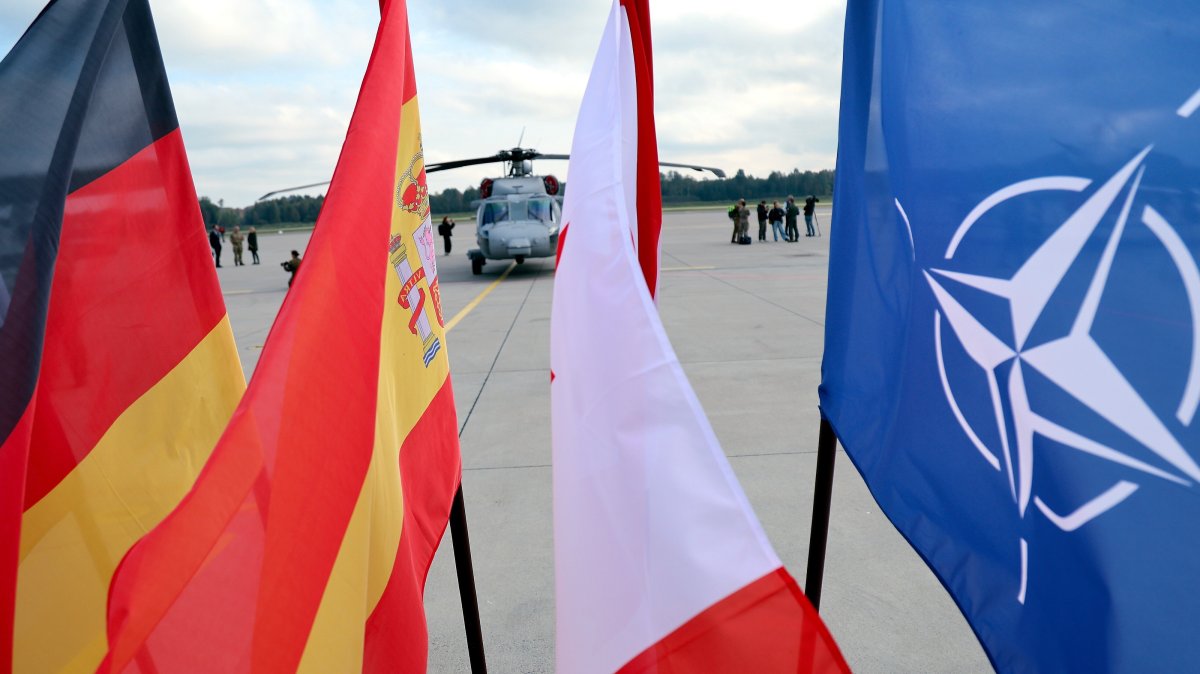 (L-R) German, Spanish, Canadian and NATO flags are seen during a NATO Media Day at Lielvarde Air Base, Latvia, Oct. 1, 2026. (EPA Pho