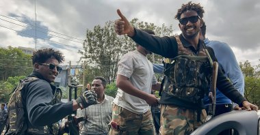 Members of the Ethiopian pro-government Tigray Peace Force (TPF) gesture as residents welcome them to Tigray capital Mekelle, Ethiopia, Oct. 4, 2026. (AFP Photo)