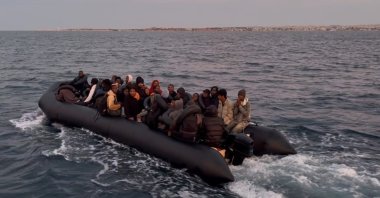 Turkish coast guard teams rescue 62 irregular migrants, including 28 children, from a rubber boat off the coast of Didim, Aydın, western Türkiye, Sept. 28, 2026. (IHA Photo)