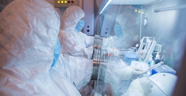This undated photo shows researchers working in a lab at Irkutsk Anti-Plague Research Institute of Siberia and Far East, Irkutsk, Russia. (AP Photo)