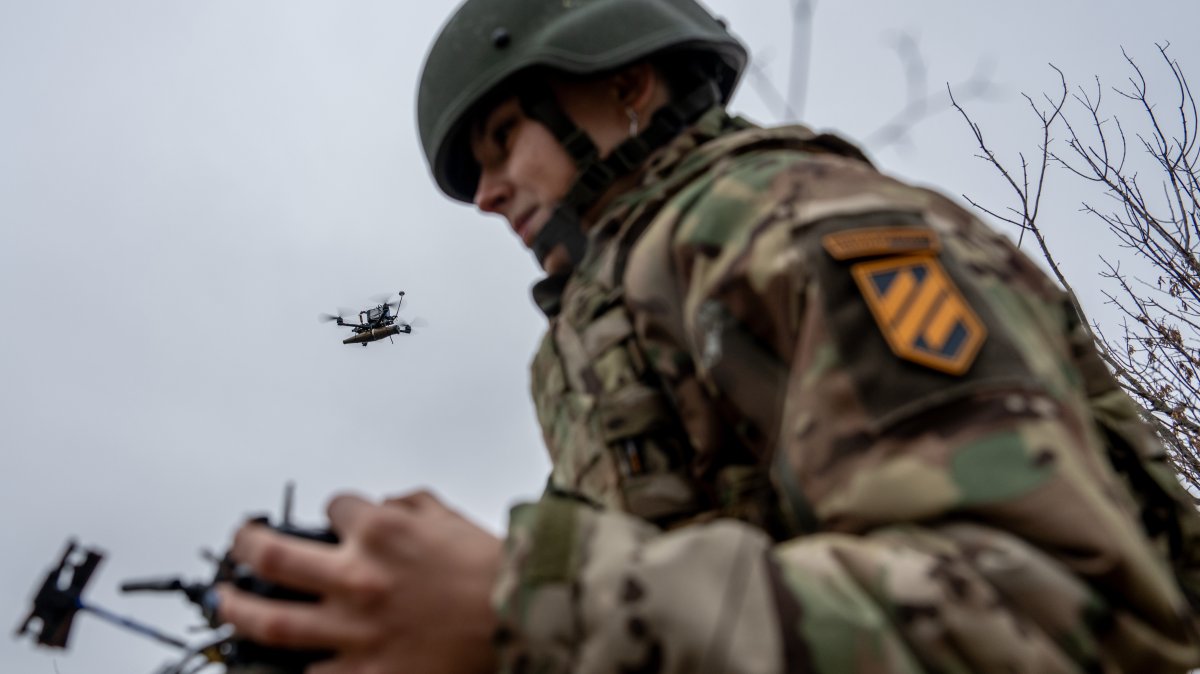 A Ukrainian drone operator pilots an FPV drone during a demonstration in Kharkiv Oblast, Ukraine, Nov. 5, 2025. (AP Photo)