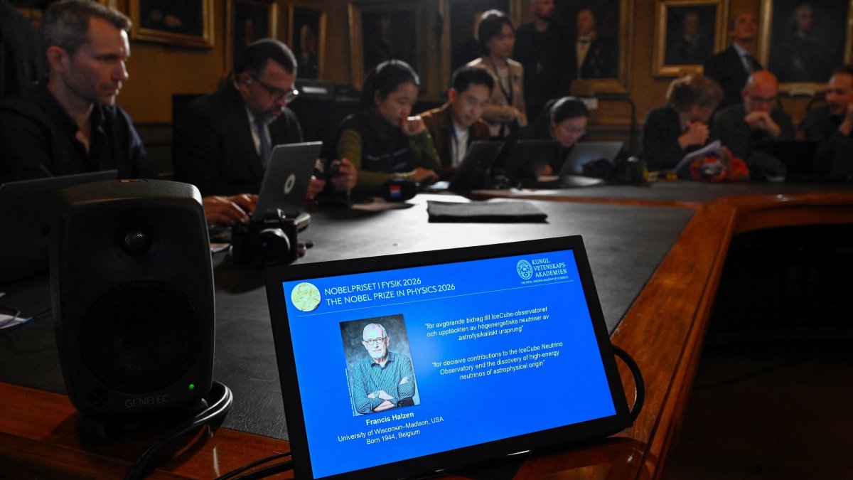 A display screen shows Francis Halzen is announced as the recipient of the 2026 Nobel Prize in Physics during a press conference at the Royal Swedish Academy of Sciences, Stockholm, Sweden, Oct. 6, 2026. (Reuters Photo)