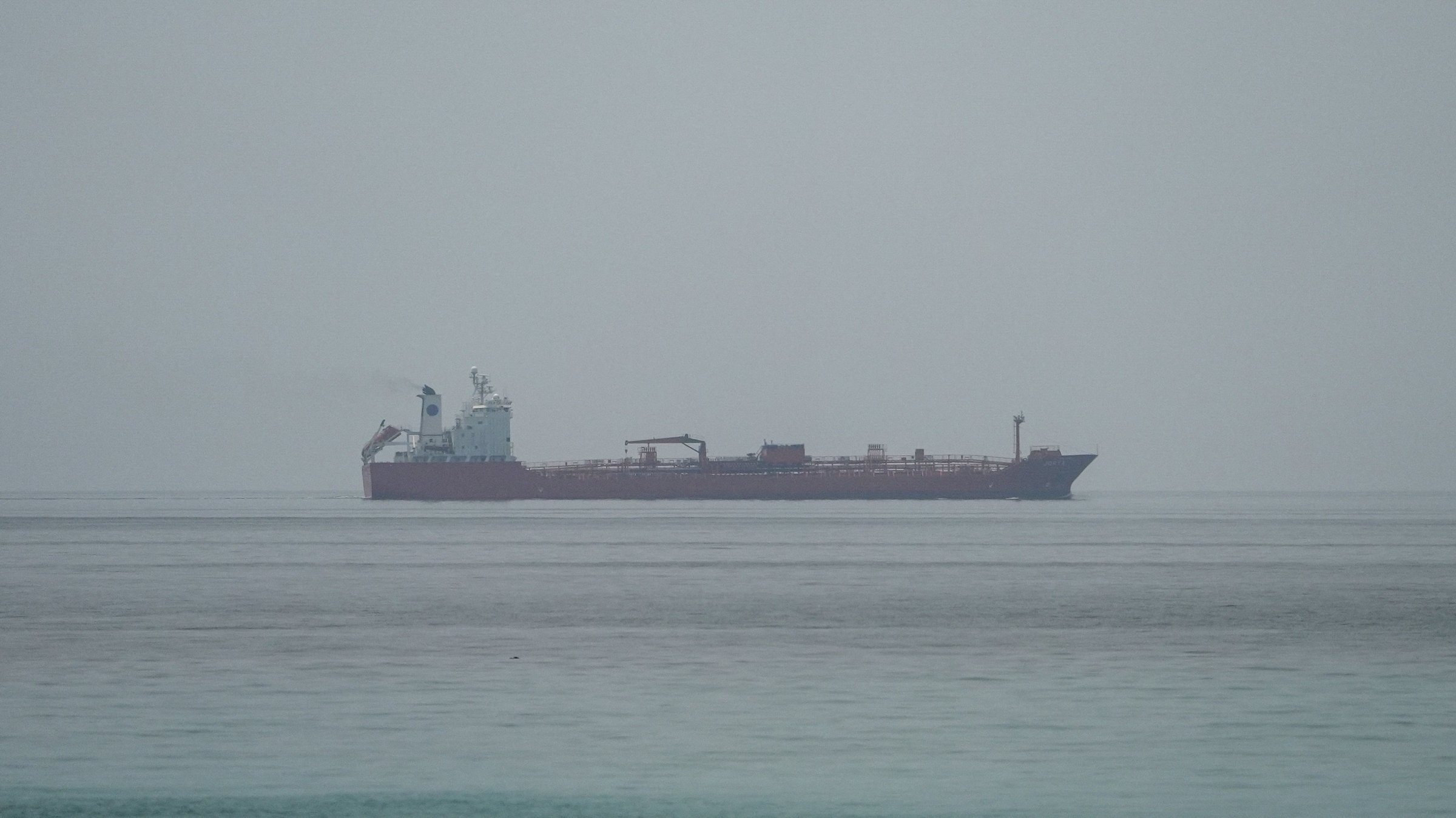  Oil tanker JORYA sails at the sea near the Omani coast, as seen from Musandam, Oman, June 25, 2026. (Reuters File Photo)