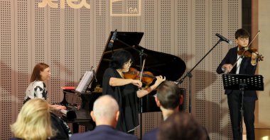 Violinists Nina Patrikidou and Yiannis Iatrou performing Mozart's works accompanied by pianist Evgenia Votanopoulou at IGA Istanbul Airport, Istanbul, Türkiye, Oct. 3, 2026. (DHA Photo)