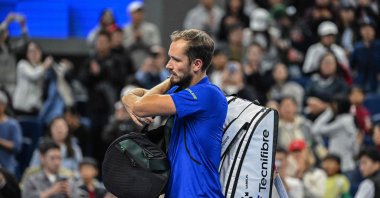 Russia’s Daniil Medvedev walks off the court after being disqualified for hitting a ball into the stands and injuring a spectator during the men’s singles semi-final against Serbia’s Novak Djokovic at the China Open, Beijing, China, Oct. 5, 2026. (AFP Photo)