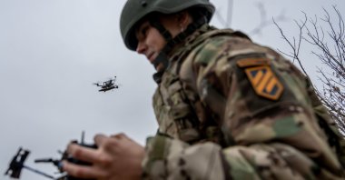 A Ukrainian drone operator pilots an FPV drone during a demonstration in Kharkiv Oblast, Ukraine, Nov. 5, 2025. (AP Photo)