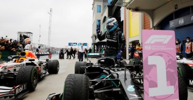 Mercedes' Valtteri Bottas gets out of the car after winning the Turkish Grand Prix race at the Intercity Istanbul Park, Istanbul, Türkiye, Oct. 10, 2021. (Reuters Photo)