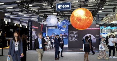 Visitors are seen on the grounds of the venue hosting the 77th International Astronautical Congress (IAC), Antalya, Türkiye, Oct. 6, 2026. (AA Photo)