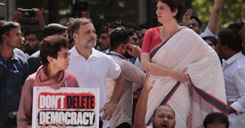 Indian Congress leaders Rahul Gandhi (C) and Priyanka Gandhi (R), along with other Indian National Developmental Inclusive Alliance (INDIA) bloc members of Parliament, take part in a protest march in New Delhi, India, Oct. 6, 2026. (EPA Photo)