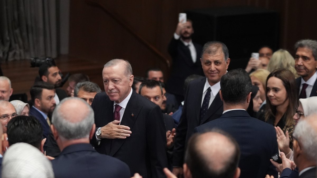 President Recep Tayyip Erdoğan enters the venue for the ceremony, with Mayor Cemil Tugay walking behind him, in Ankara, Türkiye, October 7, 2026. (AA Photo) 