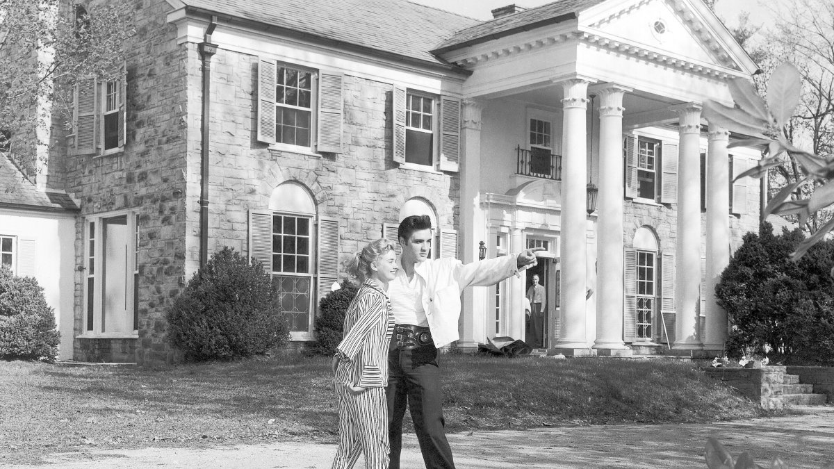Elvis Presley with his girlfriend, Yvonne Lime, at his home, Graceland, Memphis, U.S., around 1957. (AP Photo)