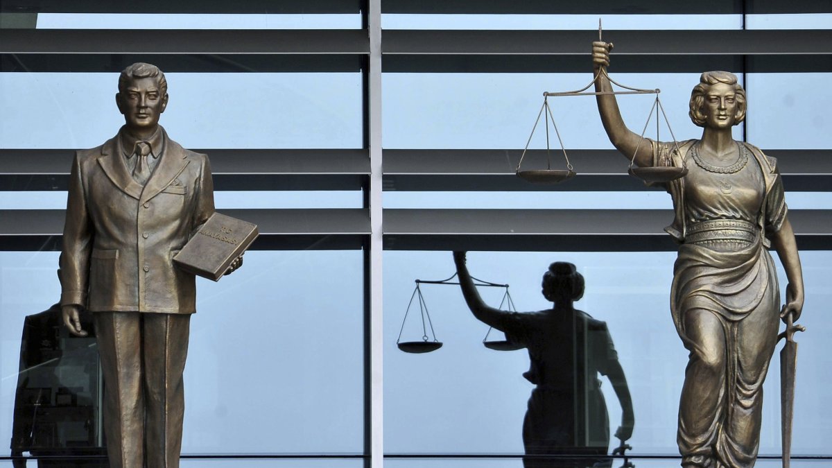 Statues at the entrance of the Constitutional Court, Ankara, Türkiye, Dec. 8, 2009. (AP Photo)