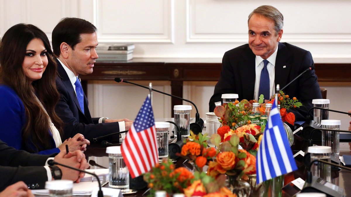 Greek Prime Minister Kyriakos Mitsotakis speaks with US Secretary of State Marco Rubio and U.S. Ambassador to Greece Kimberly Guilfoyle during an expanded meeting at the Maximos Mansion in Athens, Greece, Oct. 7, 2026. (EPA Photo)