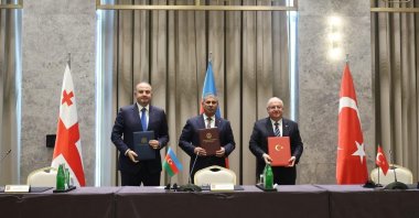 Turkish Defense Minister Yaşar Güler (R), Azerbaijani Defense Minister Zakir Hasanov (C) and Georgian Defense Minister Irakli Chikovani (L) sign the meeting protocol, Shusha, Azerbaijan, Oct. 2, 2026. (İHA Photo)