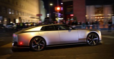 The Jaguar Type 01 all-electric four-door luxury vehicle drives on West 26th Street after the model was unveiled at its world premiere event, New York City, U.S., Oct. 6, 2026. (Reuters Photo)