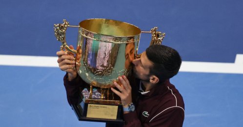 Serbia's Novak Djokovic kisses the trophy after winning the men’s singles final match at the China Open tennis tournament against Alex De Minaur of Australia, Beijing, China, Oct. 6, 2026. (EPA Photo)