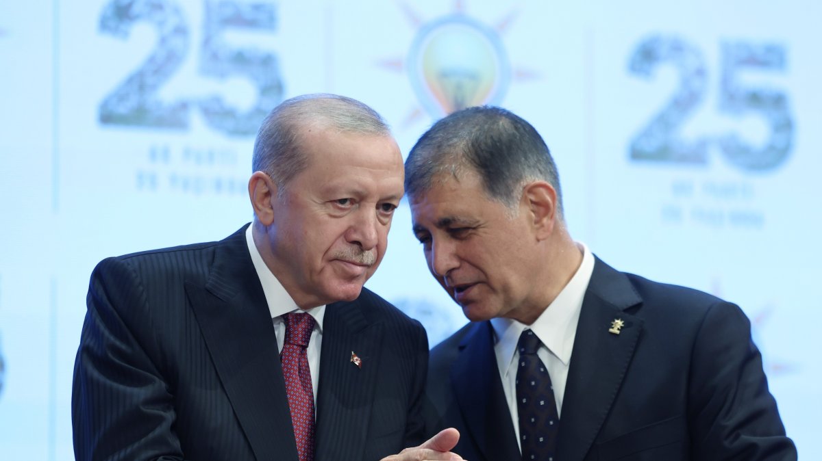President Recep Tayyip Erdoğan speaks with Cemil Tugay during a ceremony at which the mayor joined the AK Party, Ankara, Türkiye, Oct. 7, 2026. (İHA Photo)