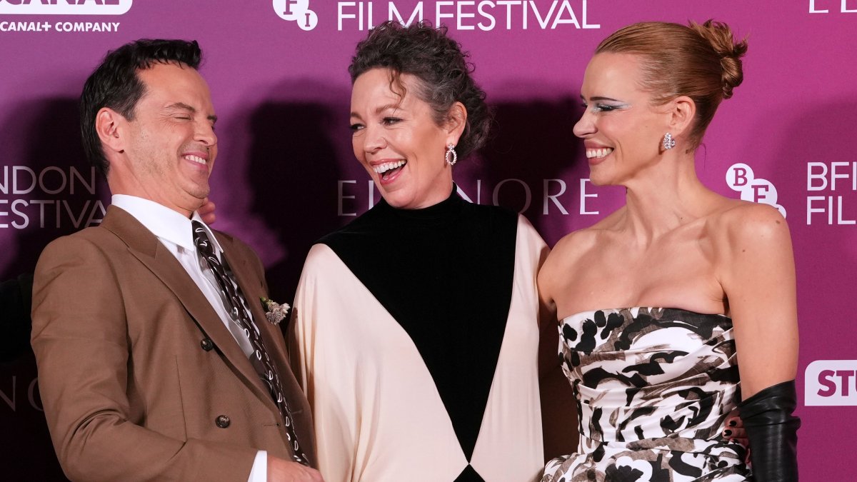 (From L-R) Andrew Scott, Olivia Colman, and Billie Piper pose for photographers upon arrival at the premiere of the film "Elsinore" as part of the London Film Festival, London, U.K., Oct. 7, 2026. (AP Photo)