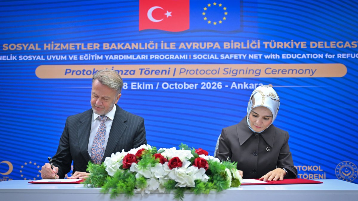 Family and Social Services Minister Mahinur Özdemir Göktaş (R) signs the protocol with EU Ambassador Aivo Orav, Ankara, Türkiye, Oct. 8, 2026. (AA Photo)
