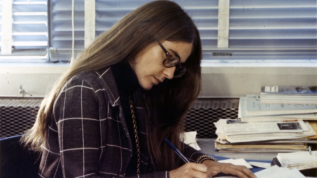 This undated handout photograph released by the Smithsonian National Air and Space Museum on July 11, 2019, shows Margaret Hamilton, a member of the Draper Laboratory staff, at work during the Apollo missions. (AFP Photo)
