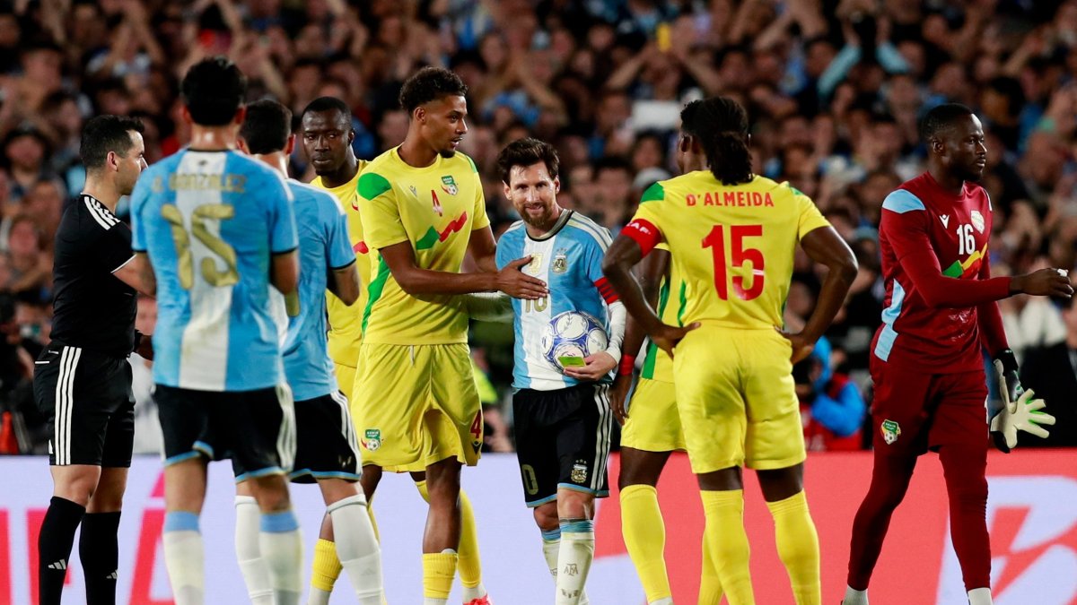 Argentina's Lionel Messi with Benin's Amiro Amadou following the international friendly match between Argentina and Benin at the Estadio Monumental in Buenos Aires, Argentina, Oct. 6, 2026. (Reuters Photo)