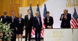 CEO of Microsoft Satya Nadella, Dell Technologies CEO Michael Dell, AMD CEO Lisa Su, Tesla and SpaceX CEO Elon Musk, NVIDIA CEO Jensen Huang, and Google co-founder Sergey Brin stand with U.S. President Donald Trump during the "A New Golden Age" summit at the US Institute of Peace, renamed The Donald J. Trump Institute of Peace by the Trump administration, in Washington, D.C., Oct. 8, 2026. (Reuters Photo)