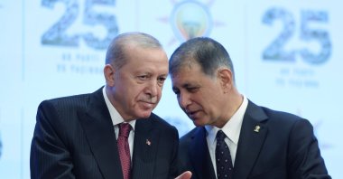 President Recep Tayyip Erdoğan speaks with Cemil Tugay during a ceremony at which the mayor joined the AK Party, Ankara, Türkiye, Oct. 7, 2026. (İHA Photo)