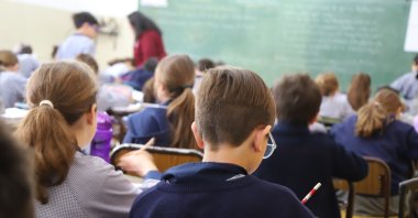 Students attend a lesson at a primary school. (Shutterstock Photo)