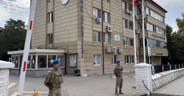 Security officers stand guard after operations outside the municipality building, Yahşihan, Kırıkkale, central Türkiye, Oct. 8, 2026. (AA Photo)