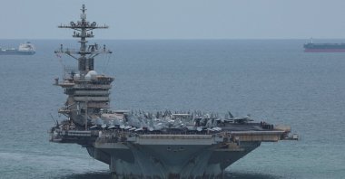 The U.S. Navy Nimitz-class aircraft carrier USS Abraham Lincoln sails toward Laem Chabang Port before docking for a rest stop following a long deployment in the Middle East, in Chonburi province, Thailand, Sept. 2, 2026. (Reuters File Photo)